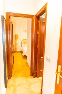 Posteľ alebo postele v izbe v ubytovaní Casa El Lance | +Patio y Paseo Marítimo