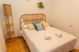 Posteľ alebo postele v izbe v ubytovaní Casa El Lance | +Patio y Paseo Marítimo