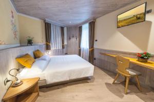Posteľ alebo postele v izbe v ubytovaní Agritur Casa Fabri