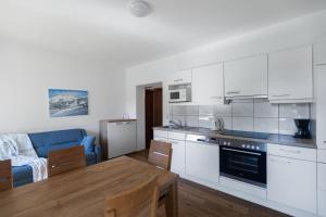 Kuchyň nebo kuchyňský kout v ubytování Alte Schule