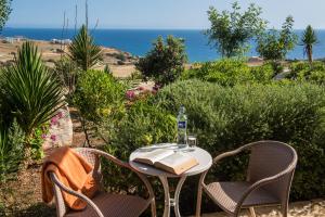 A patio or other outdoor area at Triopetra Notos Hotel