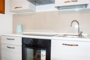 Η κουζίνα ή μικρή κουζίνα στο room with private bathroom Stella 1