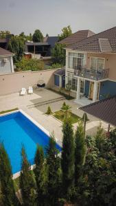 an aerial view of a house with a swimming pool at Rest Paradise Villa Gabala in Gabala