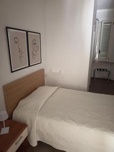 Postel nebo postele na pokoji v ubytování LOCANDA Roma sleep & food