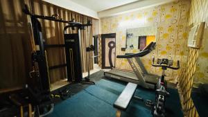 a room with a gym with a treadmill at Hotel Shivam Grand Inn in Gorakhpur