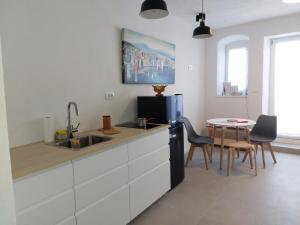 Køkken eller tekøkken på SECRET GARDEN Komiza