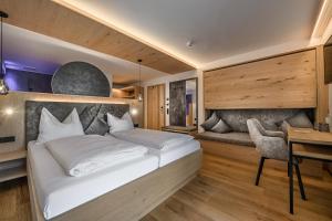 Postel nebo postele na pokoji v ubytování Hotel Hubertushof