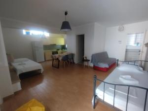 A bed or beds in a room at Lalezas Studios
