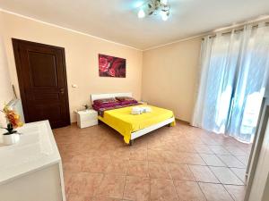 Postel nebo postele na pokoji v ubytování Casa di Simone