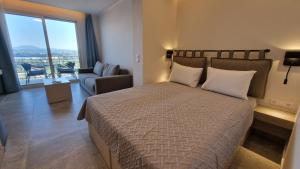 Katil atau katil-katil dalam bilik di Corfelia Seaview Suites