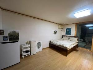 Ένα ή περισσότερα κρεβάτια σε δωμάτιο στο Cozy Camping