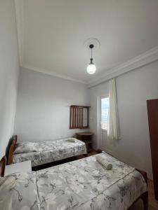 Letto o letti in una camera di Temo's guest house in Kvariati