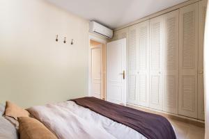 Łóżko lub łóżka w pokoju w obiekcie Casa Pinomar