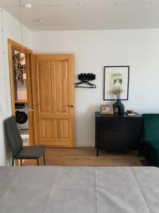 Katil atau katil-katil dalam bilik di Linden apartment +3 gambar