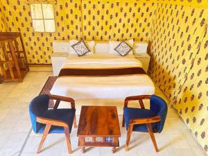 Desert island Camp & Resort Jaisalmer客房内的一张或多张床位