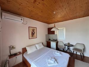 Postel nebo postele na pokoji v ubytování Apartmani Teodora