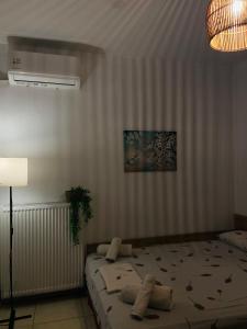 Posteľ alebo postele v izbe v ubytovaní ZISIS APARTMENTS No2