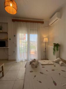 Posteľ alebo postele v izbe v ubytovaní ZISIS APARTMENTS No2