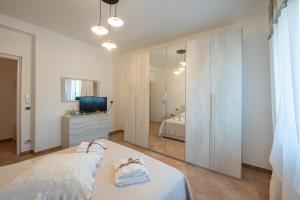 Ένα ή περισσότερα κρεβάτια σε δωμάτιο στο A casa di Colomba