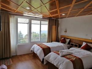 Galeriebild der Unterkunft The Woods Charikot Resort in Charikot