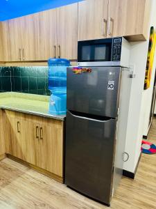 Η κουζίνα ή μικρή κουζίνα στο DMCI Bristle Ridge Condominium Baguio