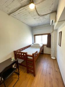 Postel nebo postele na pokoji v ubytování Nomad Hostel East