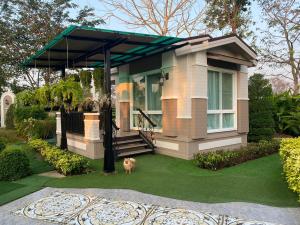 Κήπος έξω από το บ้านนิมิตรีสอร์ท +1 φωτογραφίες