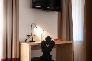 Телевізор і / або розважальний центр в Boutique Hotel Eggele