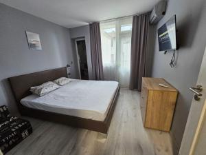 Ένα ή περισσότερα κρεβάτια σε δωμάτιο στο StelaMare