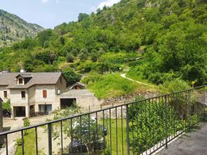 a view from the balcony of a house at Gîte Le Pigeonnier10P, Ste Enimie,Gorges du tarn, village de Saint Chély du Tarn 