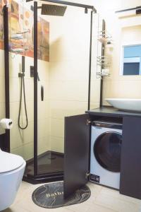 Koupelna v ubytování Apartamenty MorzeLove + 27 fotografií