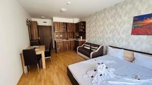 A bed or beds in a room at ADMIRAL PLAZA C 19 Private Cozy Studio SUNNY BEACH