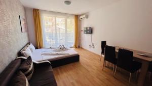 A bed or beds in a room at ADMIRAL PLAZA C 19 Private Cozy Studio SUNNY BEACH