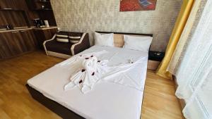 A bed or beds in a room at ADMIRAL PLAZA C 19 Private Cozy Studio SUNNY BEACH