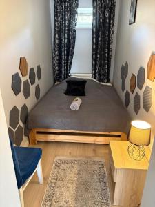 Posteľ alebo postele v izbe v ubytovaní Apartamenty Cieplicka 20