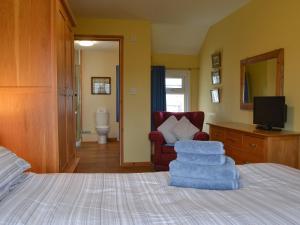 Un pat sau paturi într-o cameră la Orchard Cottage - Ukc4300 +5 fotografii