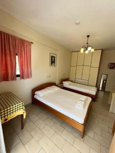 Postel nebo postele na pokoji v ubytování Villa Avra