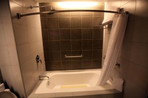 A bathroom at Microtel by Wyndham UP Technohub