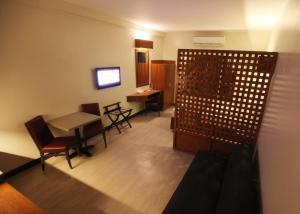 A television and/or entertainment centre at Microtel by Wyndham UP Technohub