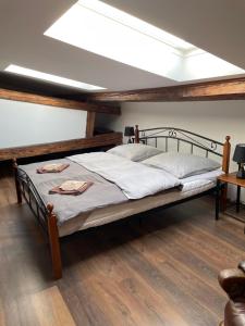 Postel nebo postele na pokoji v ubytování ART hotel MAXIM