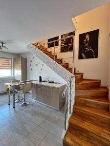 Φωτογραφία από το άλμπουμ του Penthouse Escape Otopeni An Unforgettable Experience στο Otopeni