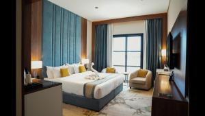 Ένα ή περισσότερα κρεβάτια σε δωμάτιο στο Rosa Grand Hotel +150 φωτογραφίες