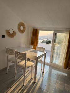 Afbeelding uit fotogalerij van Gökkuşağı Pansiyon in Kas