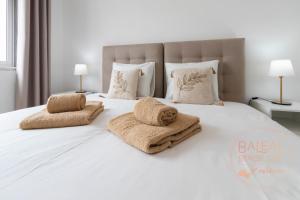 Ένα ή περισσότερα κρεβάτια σε δωμάτιο στο Baleal Beach Stay +27 φωτογραφίες