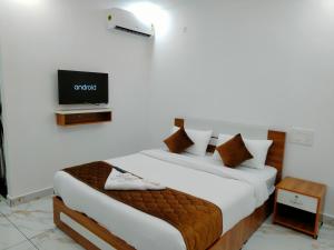 Hotel The Mountmist客房内的一张或多张床位