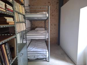 Ένα ή περισσότερα κρεβάτια σε δωμάτιο στο Théveny, Le Levant
