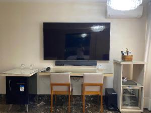 TV o dispositivi per l'intrattenimento presso Morada Supreme Itaim Bibi - Flat Duplo