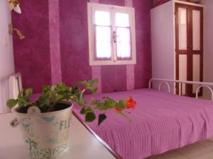 Postel nebo postele na pokoji v ubytování Aiolos Rooms