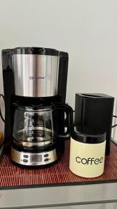 a coffee maker sitting on top of a counter at Green Forest Oasis & Sea in Strömstad +19 photos