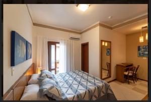 Cama ou camas em um quarto em Pousada do Almirante mais 37 fotos